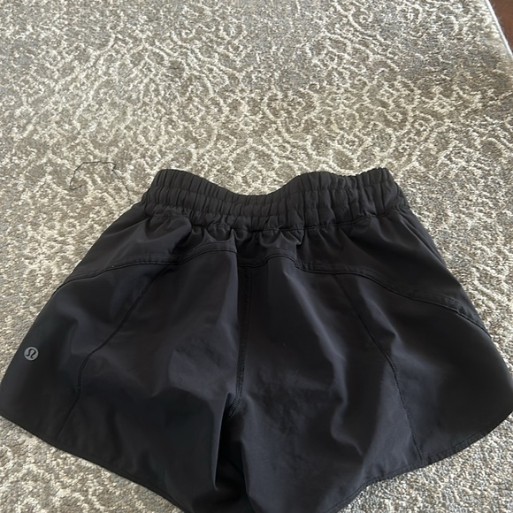 these are from lululemon they are high waisted, and they are size 6. - Picture 3 of 3